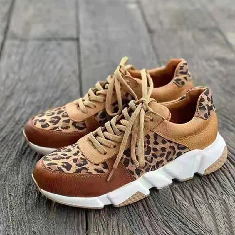 Comfortable women's leopard print lace-up sneakers, ideal for daily wear and stylish casual outfits.