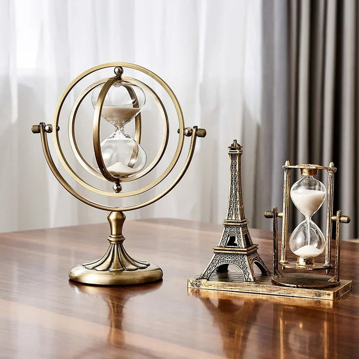 Sleek metal frame hourglass sand timer, ideal desk decor, adds elegance to any office.