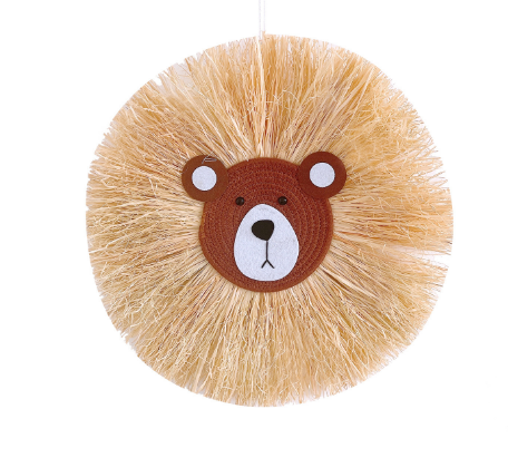 Rattan lion wall decor, a soft animal art piece for baby's nursery or a child's bedroom.