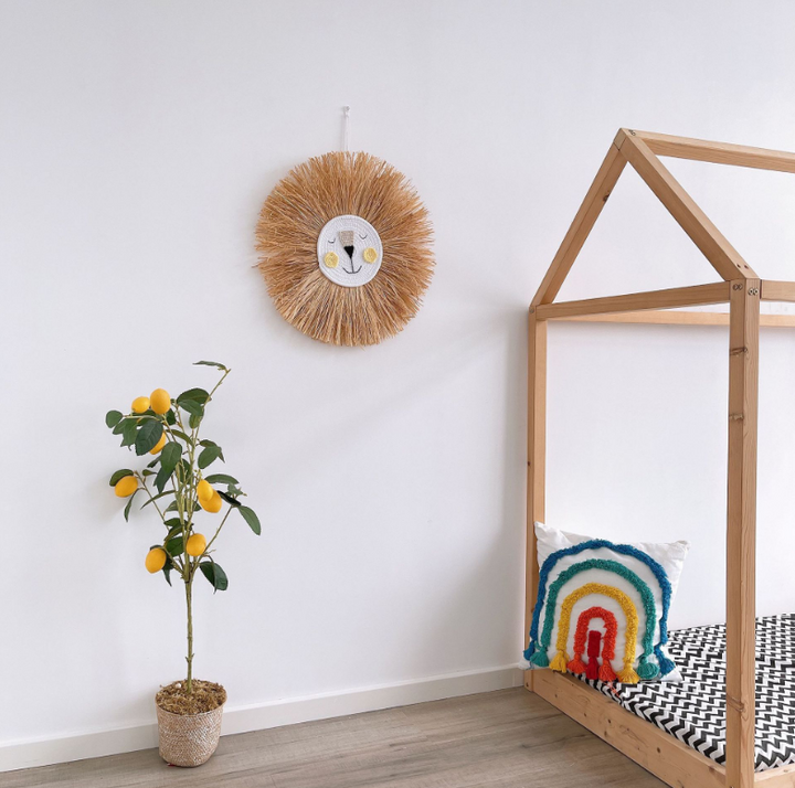 Soft animal art: handmade rattan bear wall decor for a cozy baby bedroom or nursery.