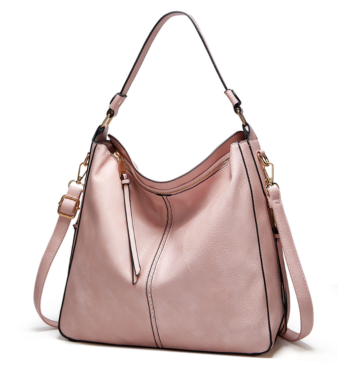 Elegant women's leather tote, spacious design for daily essentials.