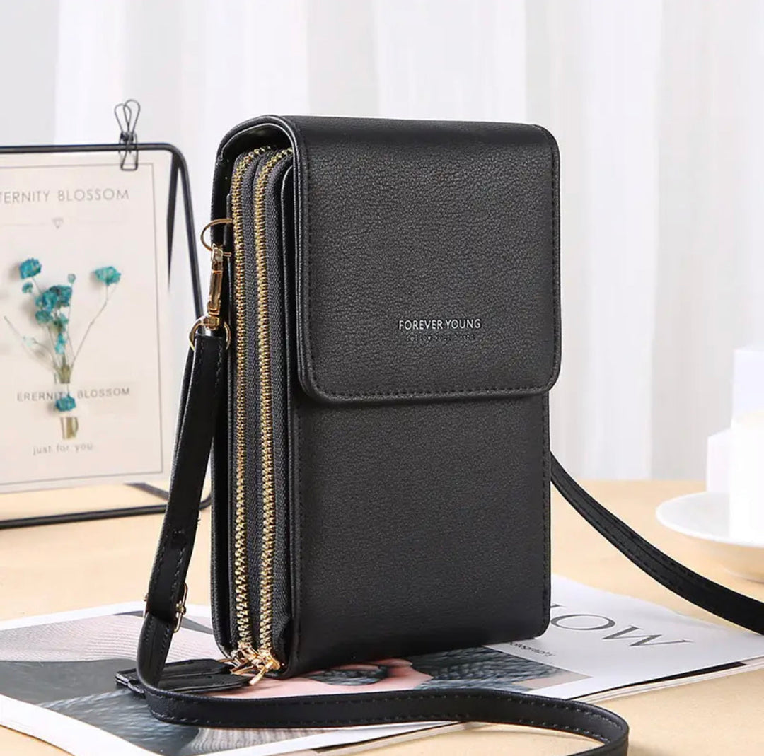Stylish women's handbag, doubles as a crossbody or tote. An all-year fashion essential & organized daily bag.