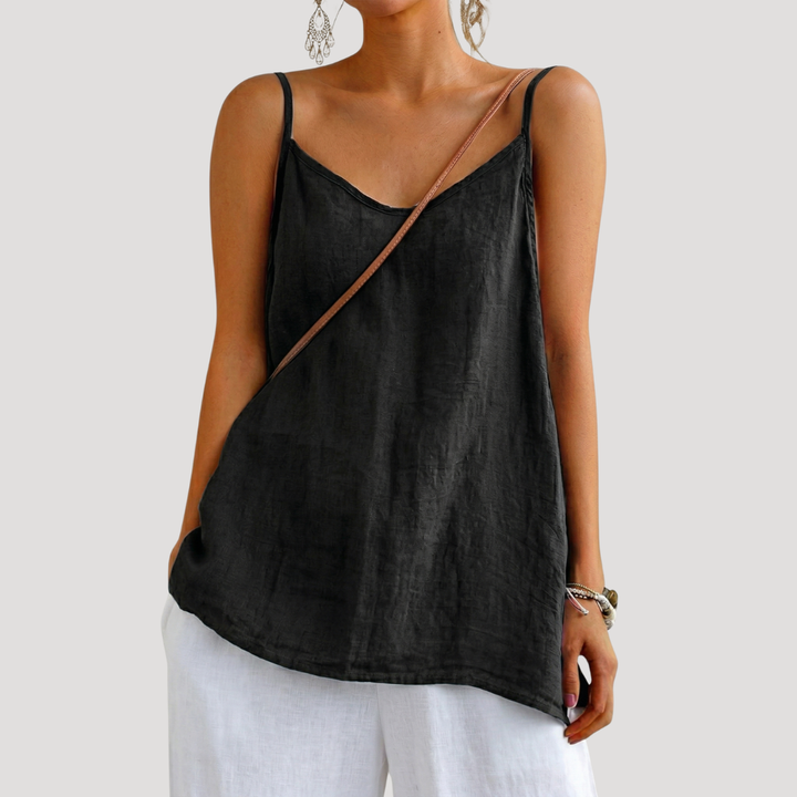 Stylish women's V-neck flowy cami with thin spaghetti straps. A versatile, casual summer top in a relaxed fit.