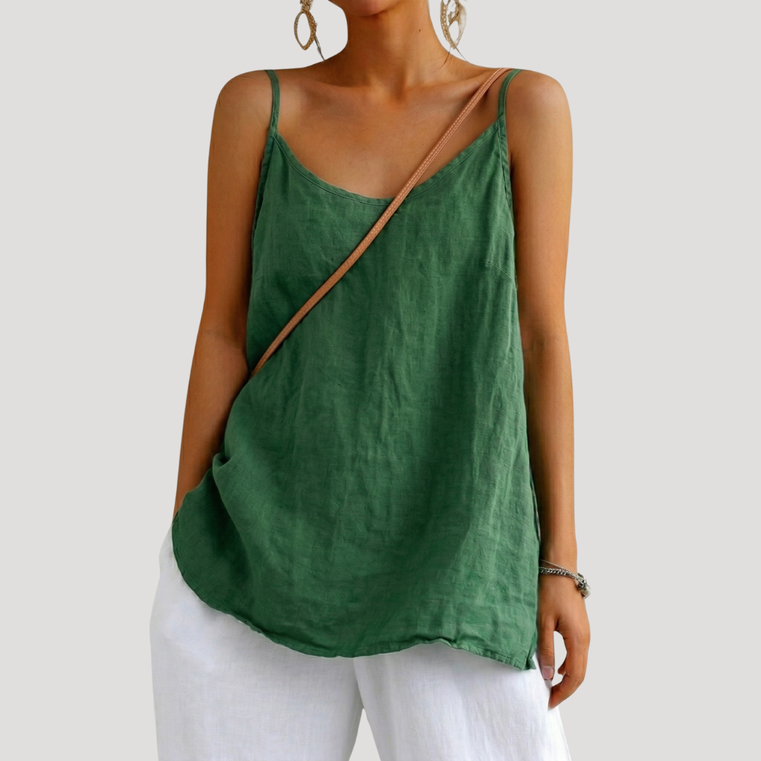 Women's V-neck cami top with spaghetti straps, flowy summer style. Sleeveless and relaxed fit apparel.