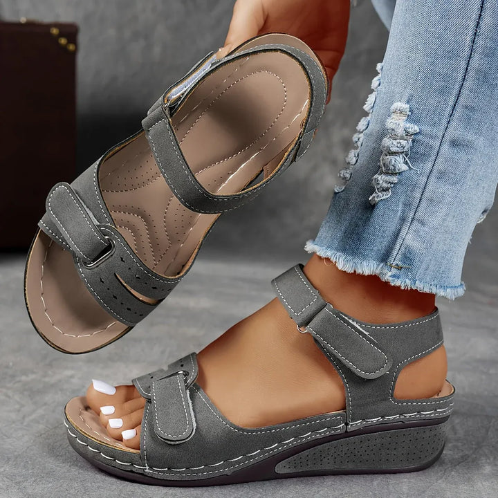 Women's walking sandals: orthopedic strap design provides superior comfort & support for summer adventures.