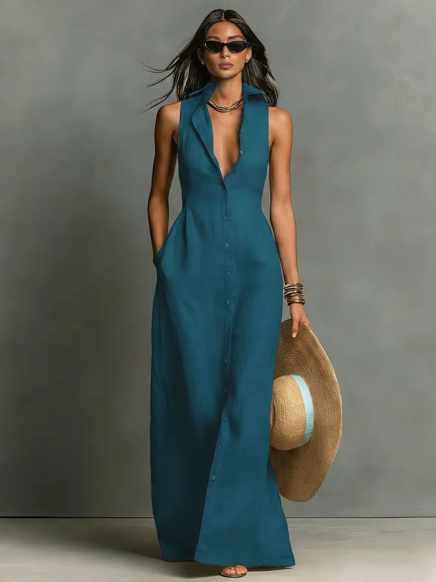 Chic women's sleeveless button-front maxi shirt dress. Floor-length for elegant casual summer style.