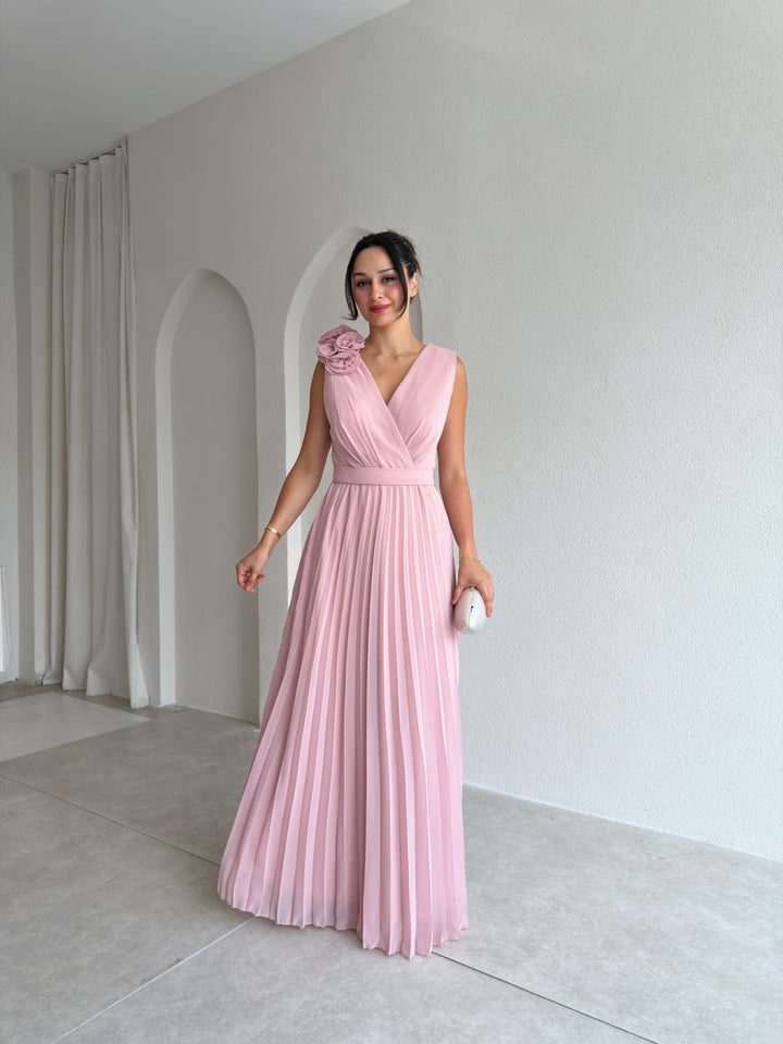 Women's graceful A-line cocktail dress with flowing pleats & intricate floral appliqué. Perfect for special events.