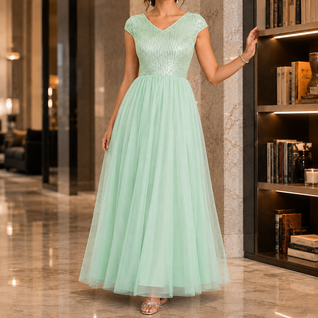 Glamorous V-neck embellished long gown for women. Cap sleeve, ideal for formal parties & evening events.