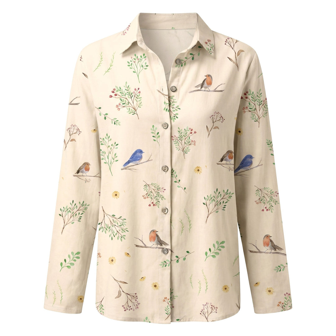 Stylish women's V-neck blouse with abstract print and functional roll-up sleeves. Great for spring.