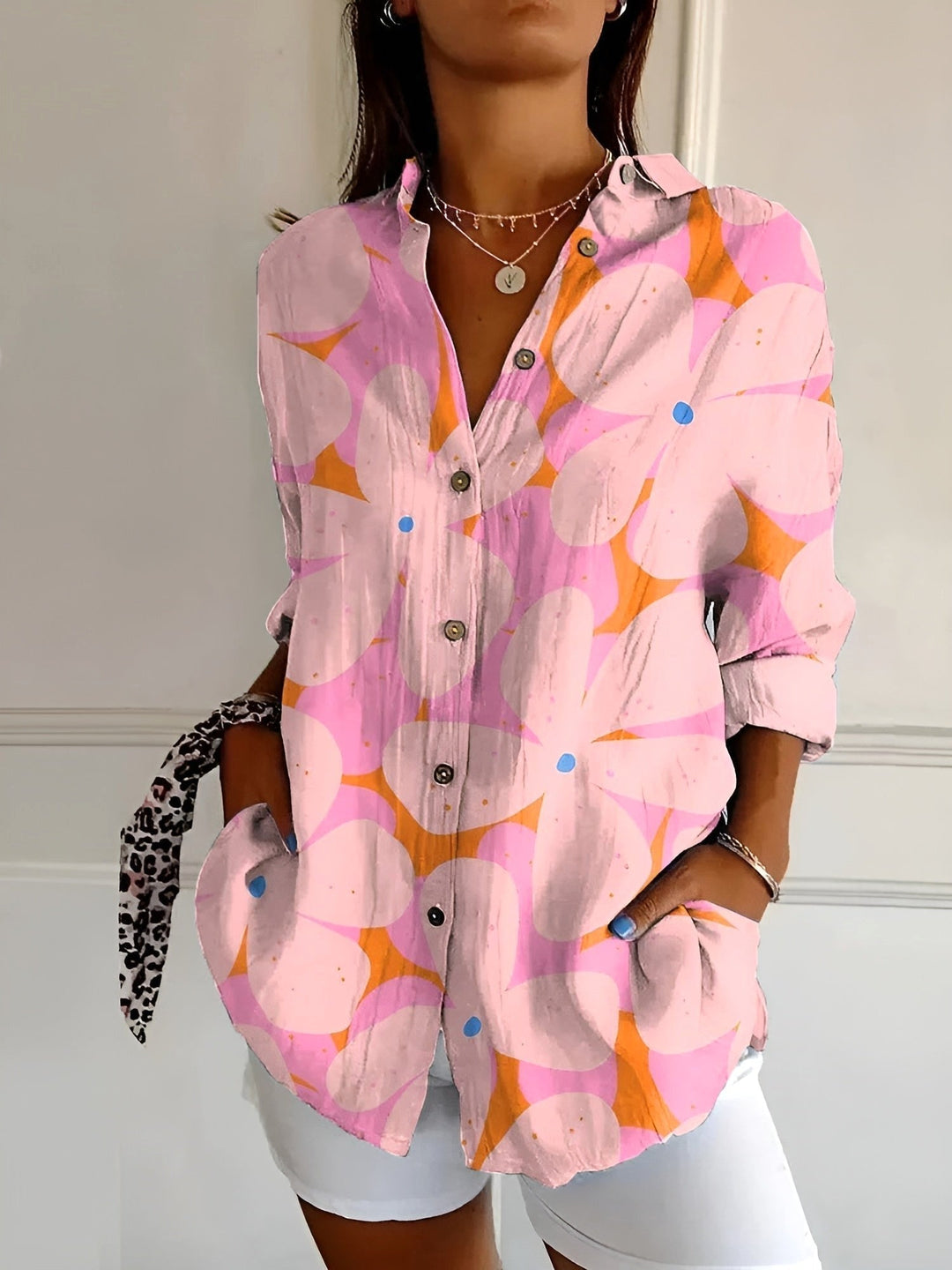 Multicolor abstract print casual women's top, split V-neck, roll-up sleeves. Everyday fashion.
