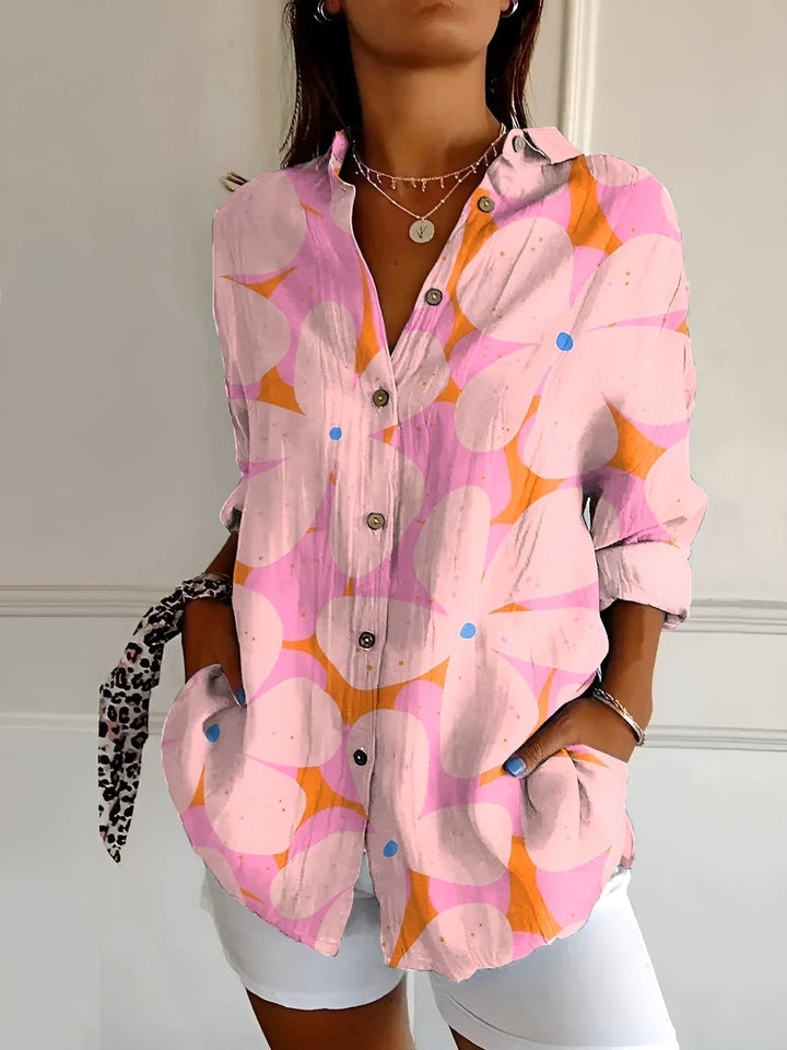 Multicolor abstract print casual women's top, split V-neck, roll-up sleeves. Everyday fashion.