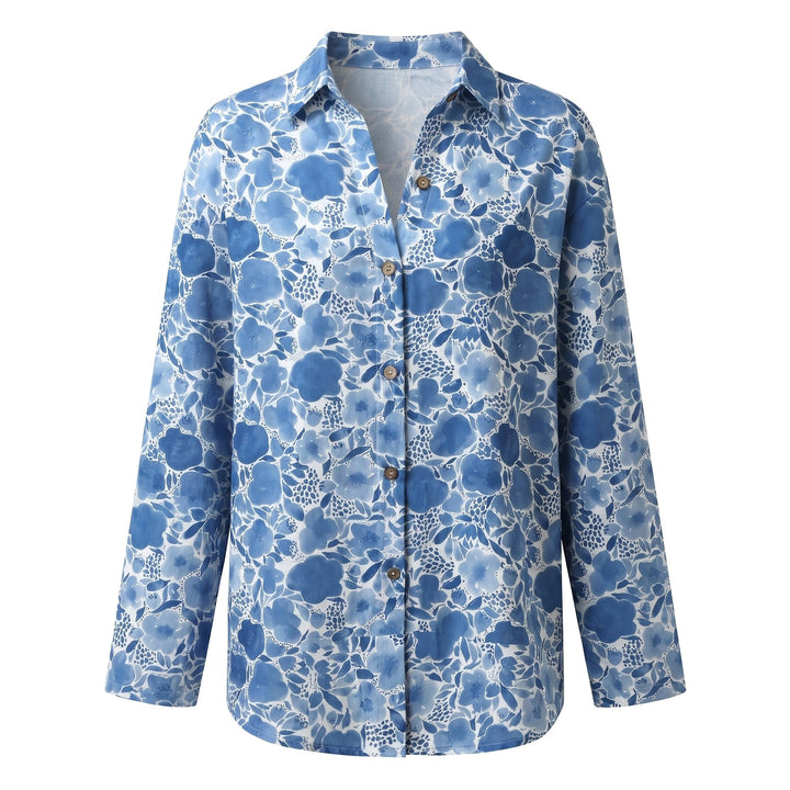 Stylish women's abstract print V-neck blouse, relaxed fit, roll-up sleeves, perfect for summer.