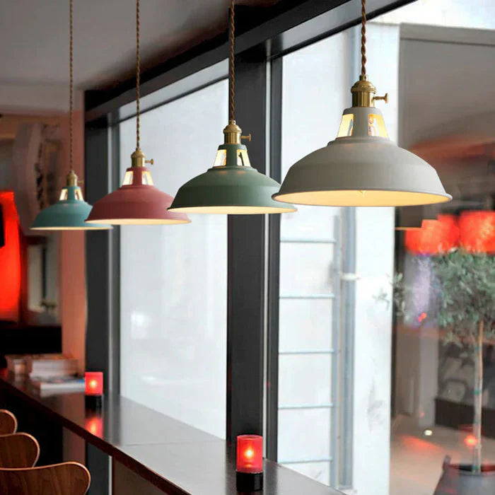 Dark metal industrial pendant light, ideal for vintage-themed interiors.