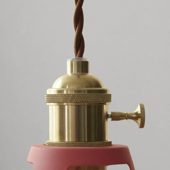 Stylish retro pendant light with exposed bulb design for dining areas.