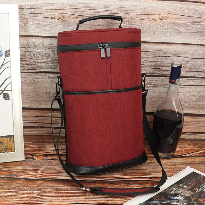 Insulated 2-bottle wine carrier tote bag with adjustable strap for secure, portable wine transport.