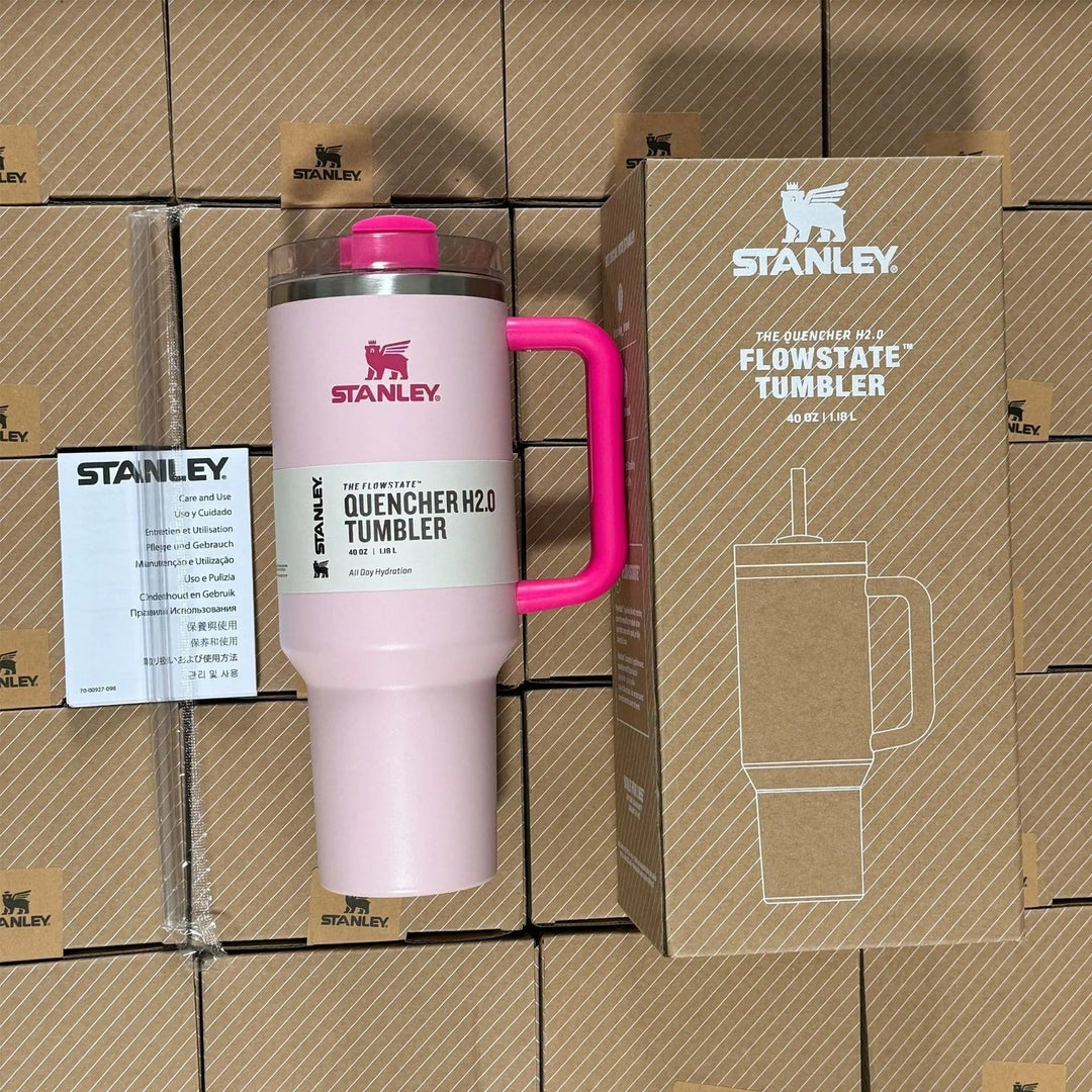 Unisex 40oz insulated travel mug with sturdy handle & reusable straw. Perfect for hot or cold drinks.