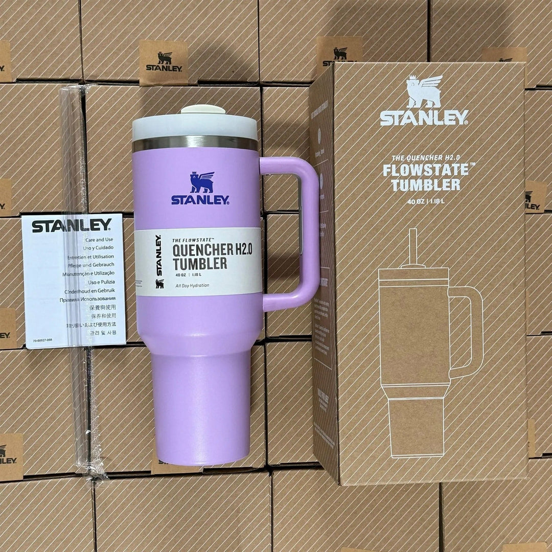 Portable 40oz insulated mug, featuring a comfortable handle & straw for easy hydration.