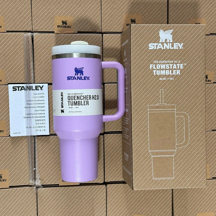 Portable 40oz insulated mug, featuring a comfortable handle & straw for easy hydration.