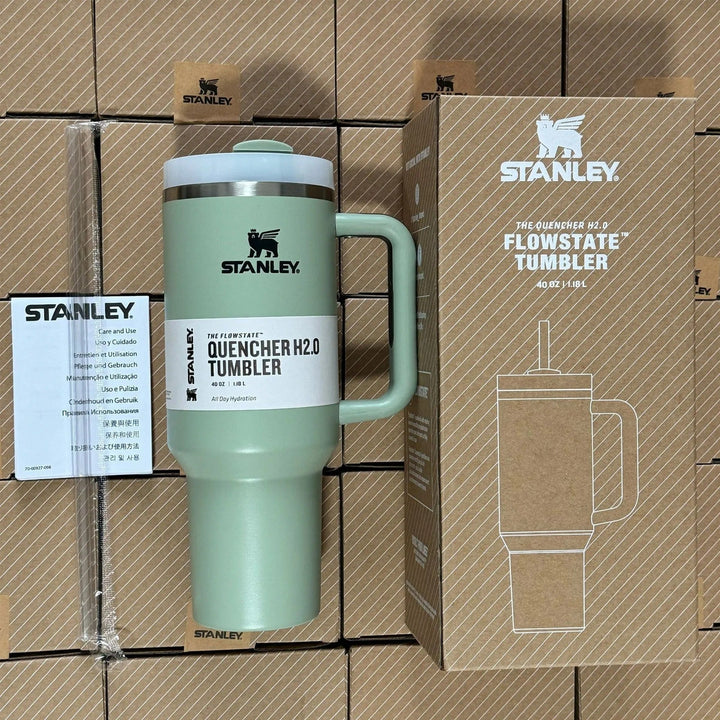 Ergonomic handle on a 40oz insulated tumbler, includes a reusable straw. Great for all.