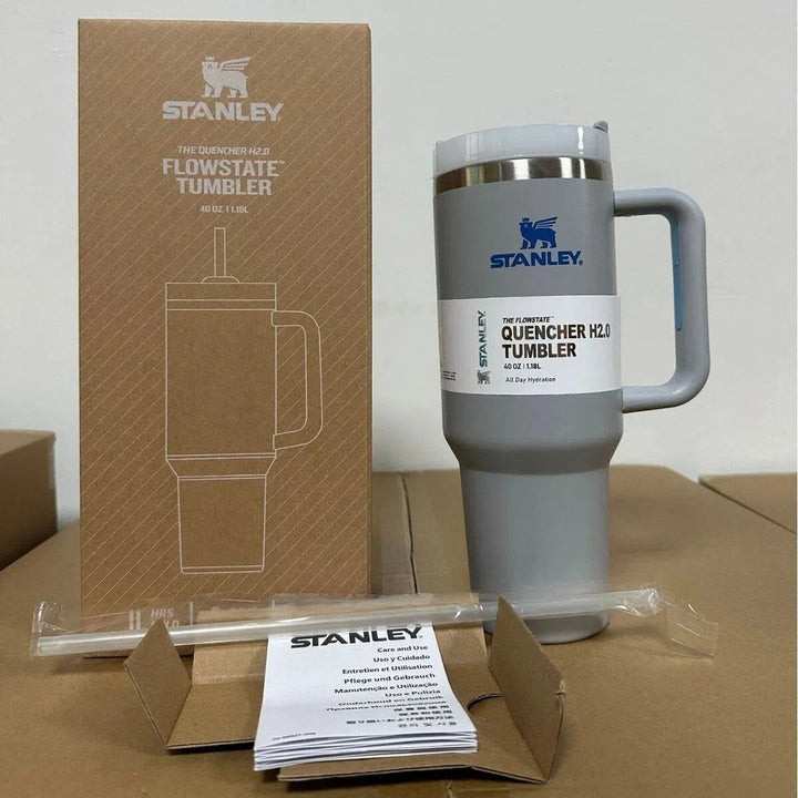 Hydration on-the-go with this unisex 40oz insulated tumbler, featuring handle & straw.