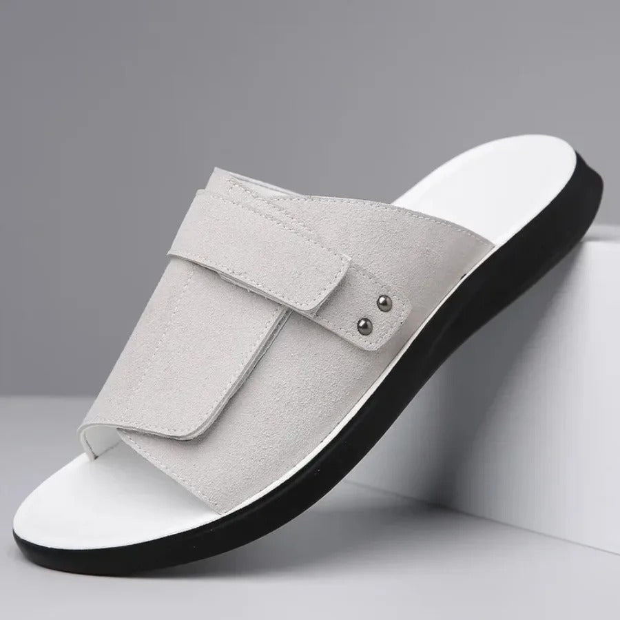 Durable men's slip-on comfort slides with adjustable strap. Versatile casual footwear for summer.