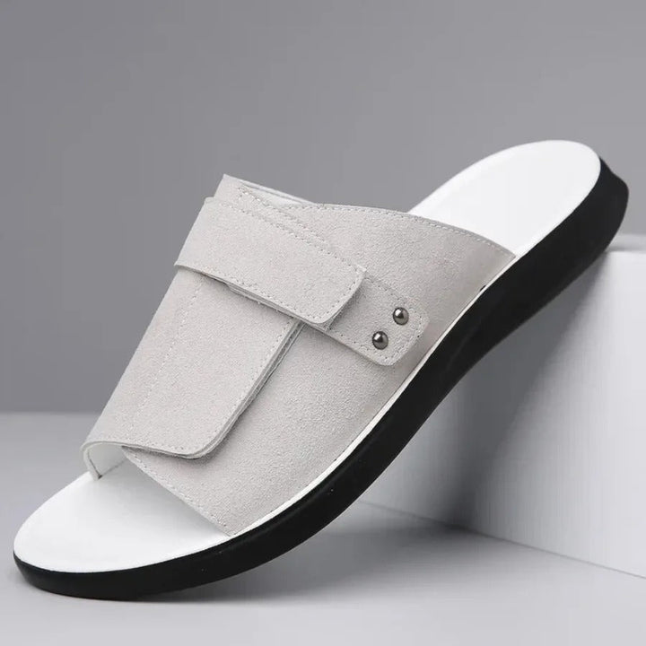 Durable men's slip-on comfort slides with adjustable strap. Versatile casual footwear for summer.