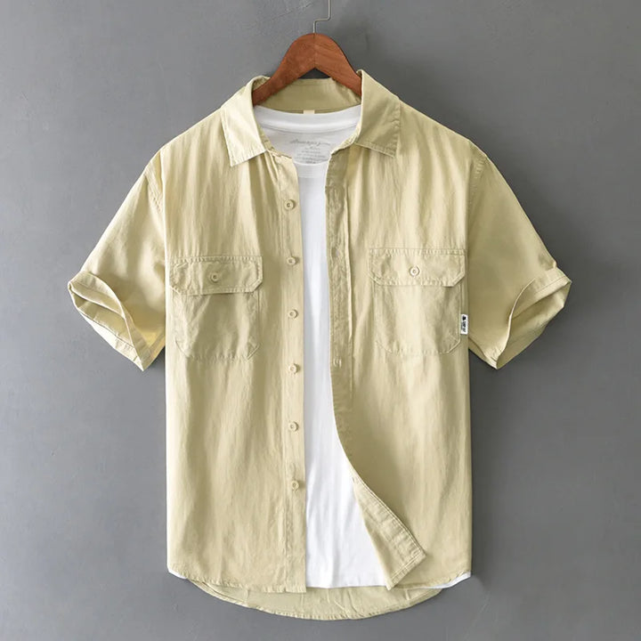 Men's Timeless Twin-Pocket Short Sleeve Fishing Shirt in khaki, relaxed fit, perfect for outdoor & casual wear.
