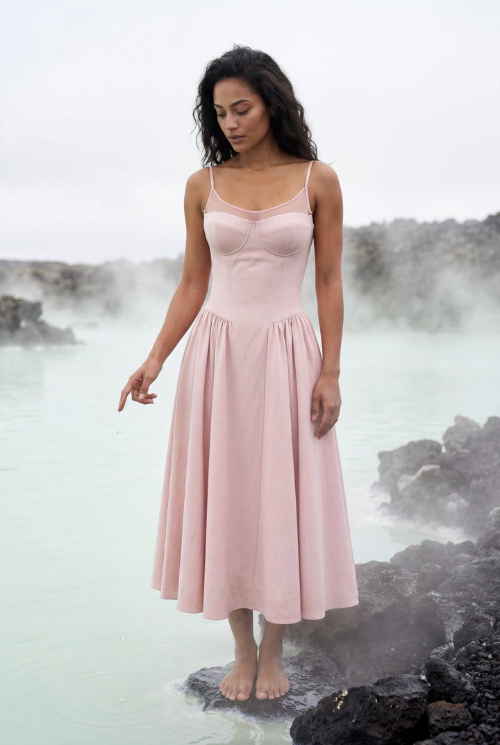 Chic floral corset midi dress, feminine style for warm weather celebrations.