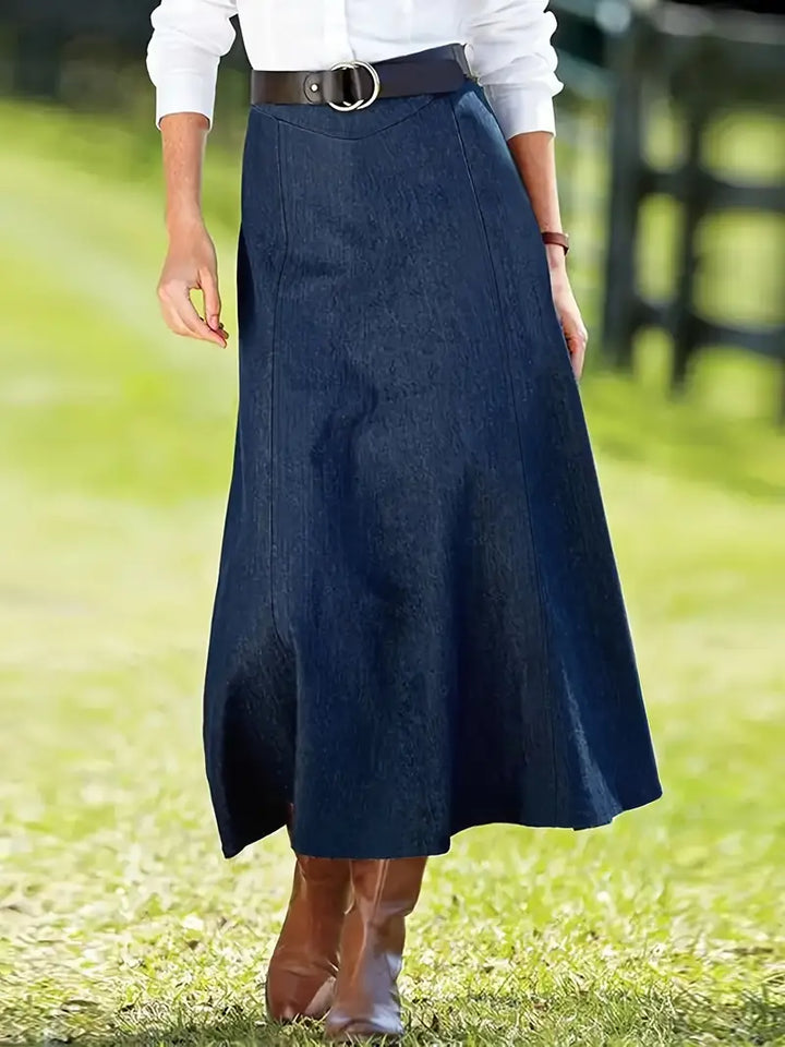 Feminine A-line midi skirt with a denim look, flared design. Stylish & comfortable for women's casual fashion.