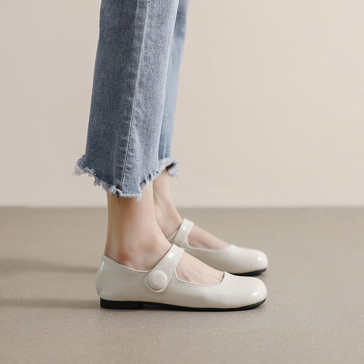 Women's graceful round toe Mary Jane flats with an adjustable strap, perfect for elegant and comfortable wear.