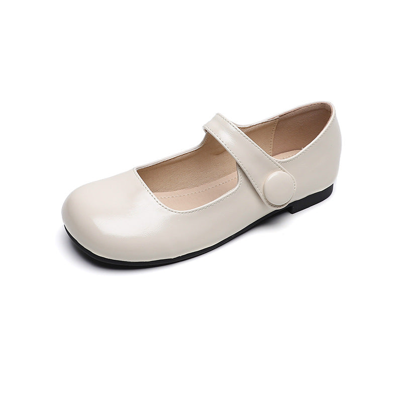 Elegant women's Mary Jane flats with a graceful round toe & adjustable strap. Perfect dress shoes for any occasion.