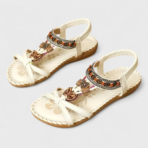 Stylish women's bohemian T-strap flat sandals. Orthopedic & comfortable for summer walking.