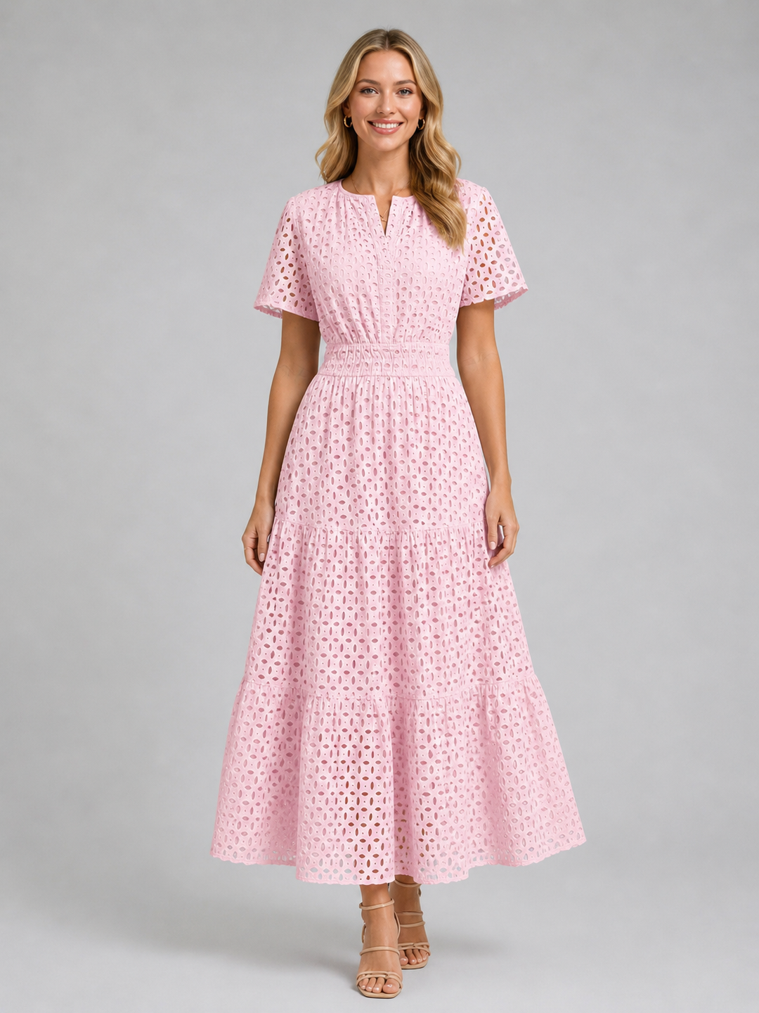 White eyelet A-line midi dress for women, featuring a tiered skirt and flutter sleeves, a chic casual summer outfit.