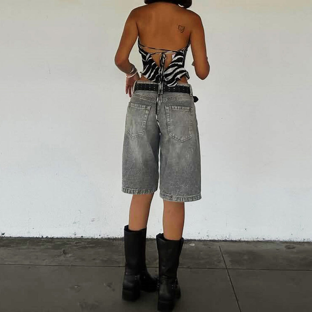 Light blue high-waisted relaxed denim shorts for women, a comfortable casual summer staple.