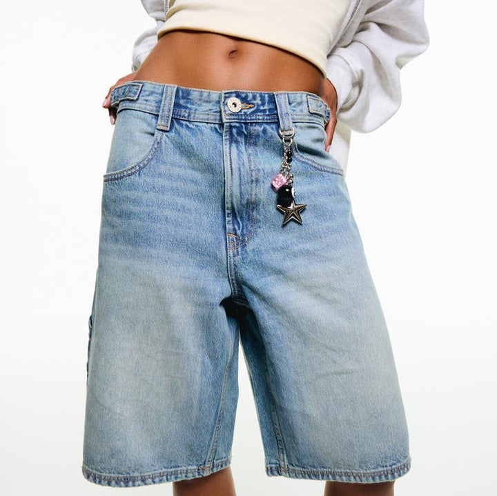 Casual high-waisted denim shorts for women, a relaxed fit essential for effortless summer outfits.