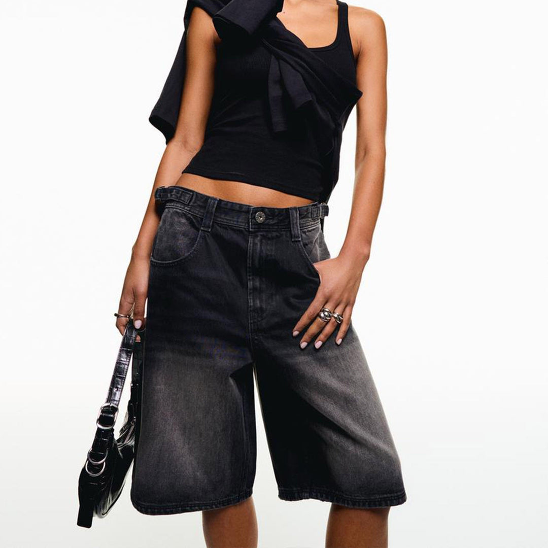 High-waisted relaxed fit women's denim shorts in a light wash, great for everyday summer style.