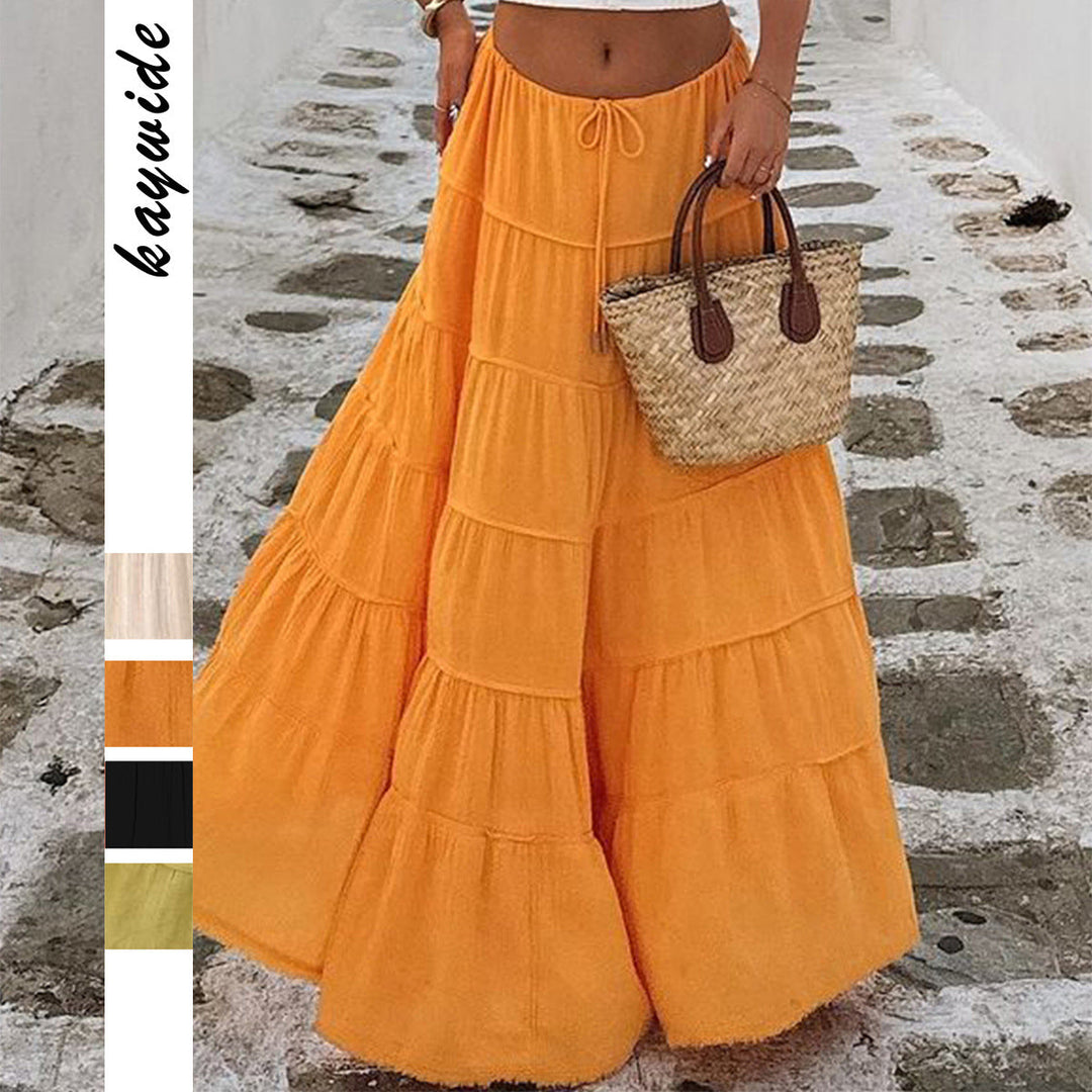 Effortless flowy tiered boho midi skirt for women, ideal for relaxed summer and weekend fashion.