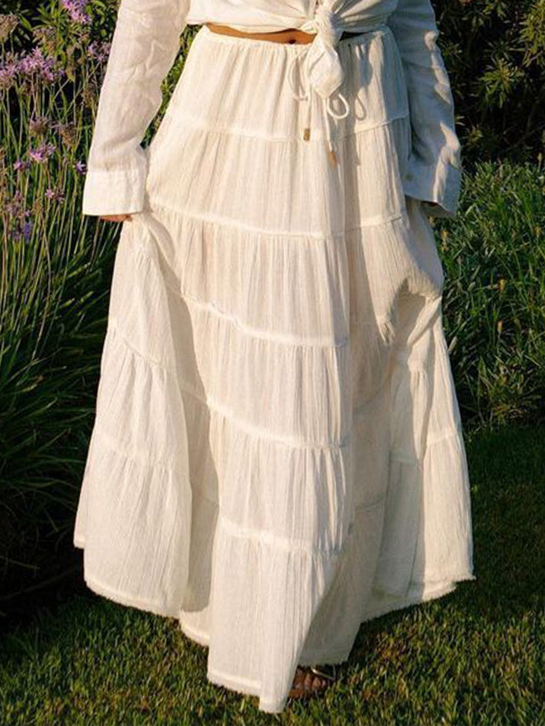 Women's tiered boho midi skirt, excellent for beach trips, summer evenings, and effortless casual fashion.