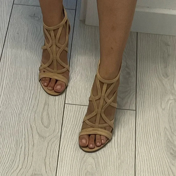 Modern women's gladiator high heel sandals. 4.3-inch heels with an elegant open-toe strappy design for fashion.
