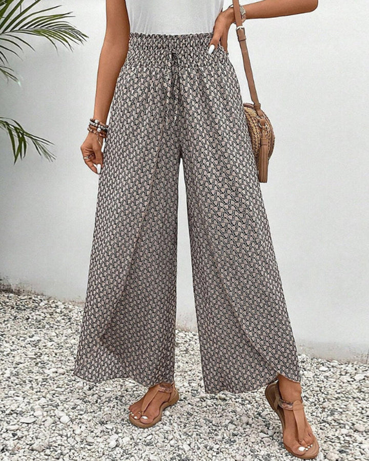 Women's Isolde geometric print wide leg pants, high waist, flowy & stylish for casual wear.