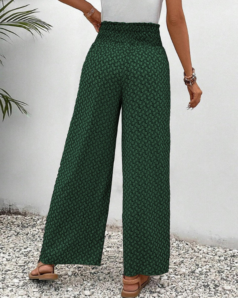 Comfortable women's Isolde wide leg pants with a bold geometric print, high waist, and flowy design for fashion.