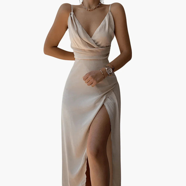 Stylish green wrap front maxi dress for women, offering a comfortable fit & alluring thigh split. Chic party dress.