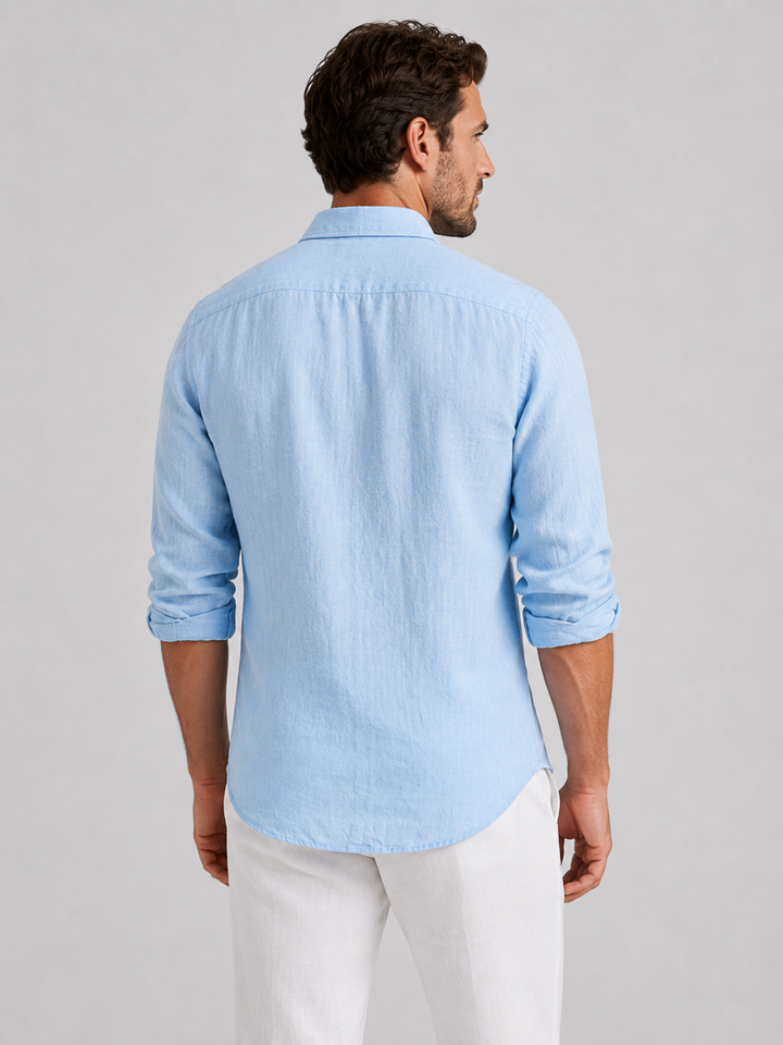 Versatile men's collared button-up shirt. Relaxed fit, long sleeve casual top ideal for summer style.