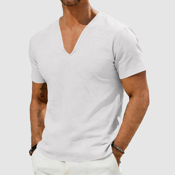 Comfortable men's relaxed fit V-neck t-shirt. Textured pullover design, perfect for casual summer fashion.