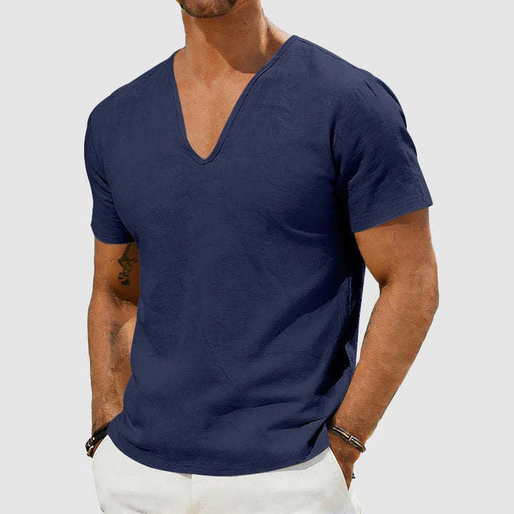 Modern men's V-neck t-shirt with subtle texture. Short sleeve, versatile for everyday wear & summer comfort.