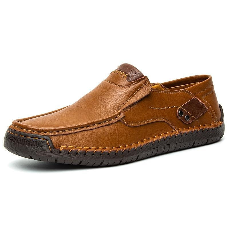 Close-up of men's refined black slip-on loafers with orthopedic support, ideal for comfortable daily wear.