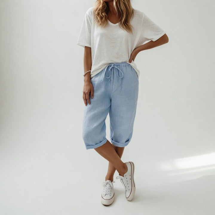Stylish women's relaxed-fit Bermuda shorts, essential for summer fashion & vacation wear.