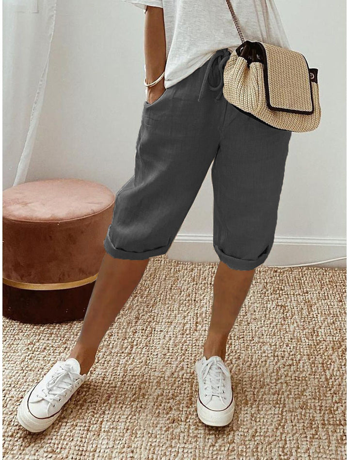 Women's relaxed Bermuda shorts, a comfortable choice for casual warm weather and summer activities.
