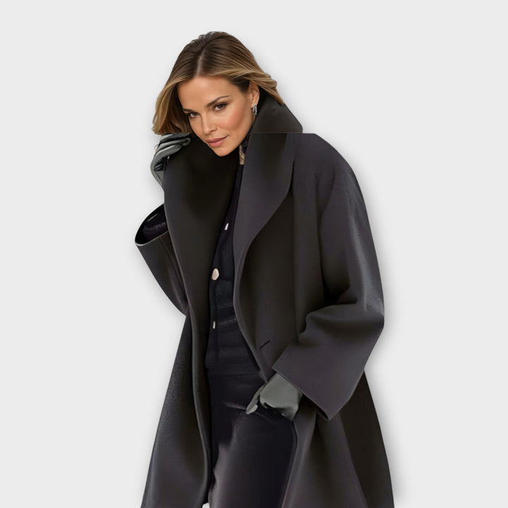 Elegant women's oversized wool coat for winter, long sleeve, stylish and windproof outerwear.