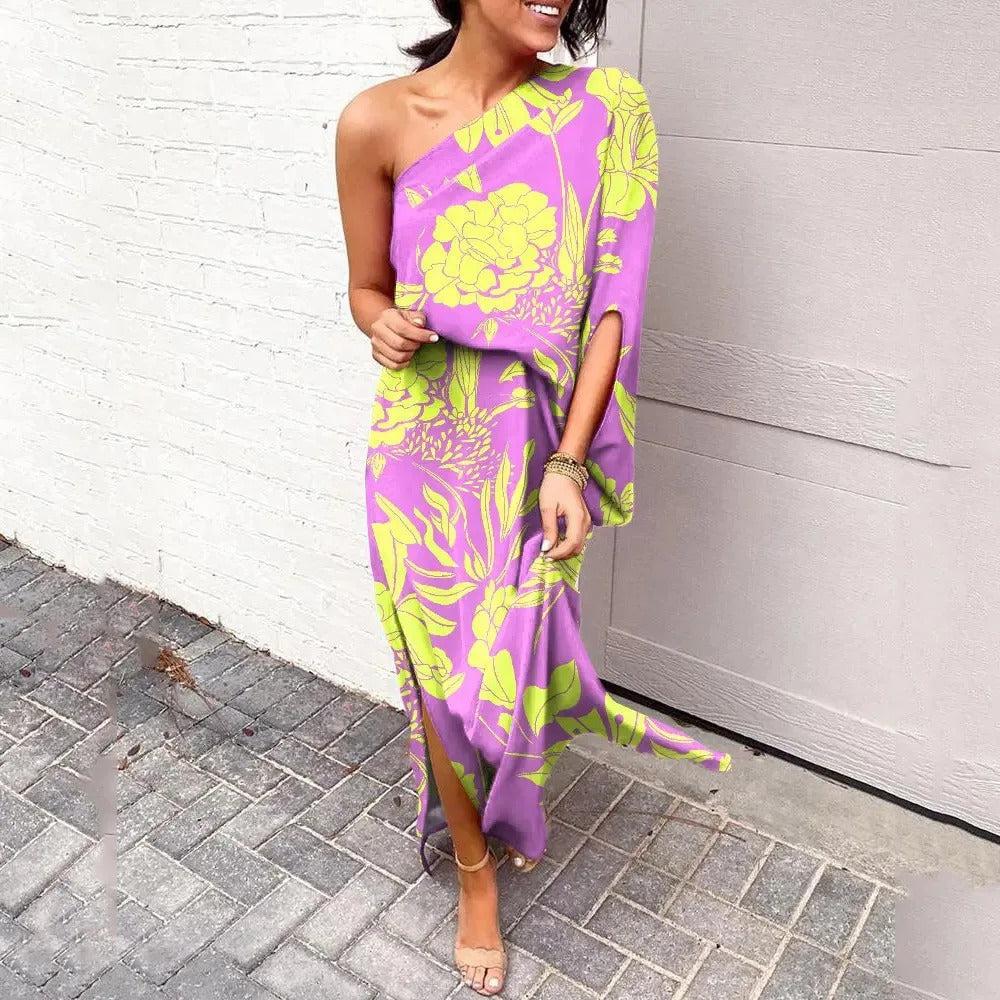 Relaxed fit one-shoulder floral maxi dress. Draped elegant women's wear, perfect for race day & summer events.